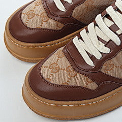 Gucci GG embossed low top sneakers